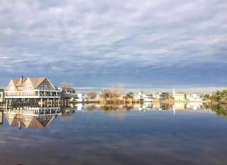 houses reflected in the water